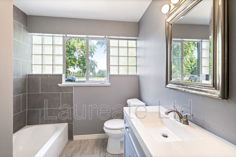 Spacious 3+ Bedroom triplex unit 2 blocks from City Park!!! property image