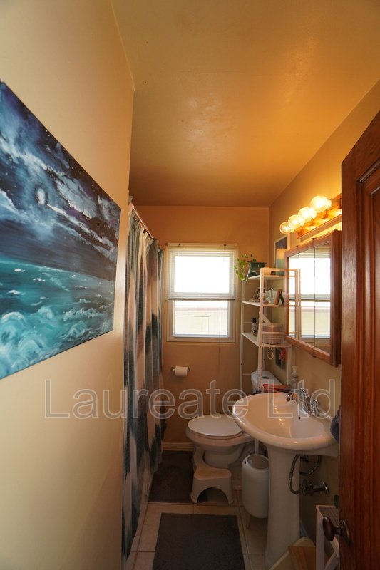 Charming 1 Bedroom Single Family Home with basement in Downtown Englewood!! property image